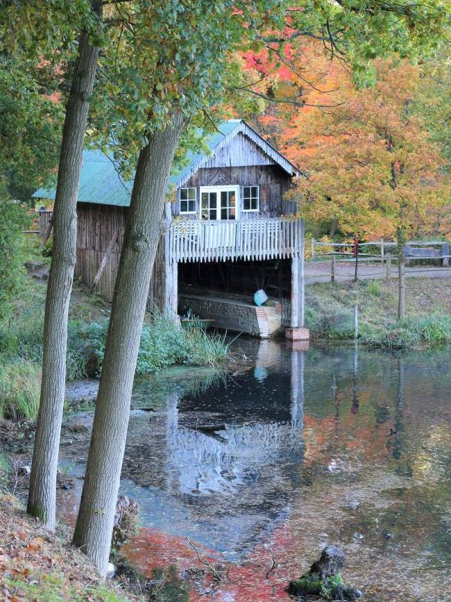 Lake boathouse Winkworth Arboretum